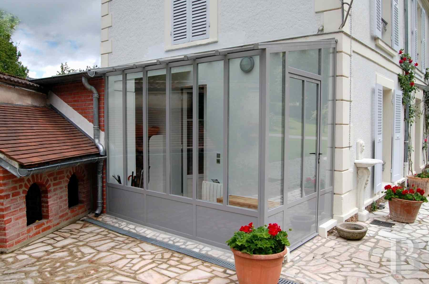 A 19th century manor house with outbuildings in SeineetMarne, less