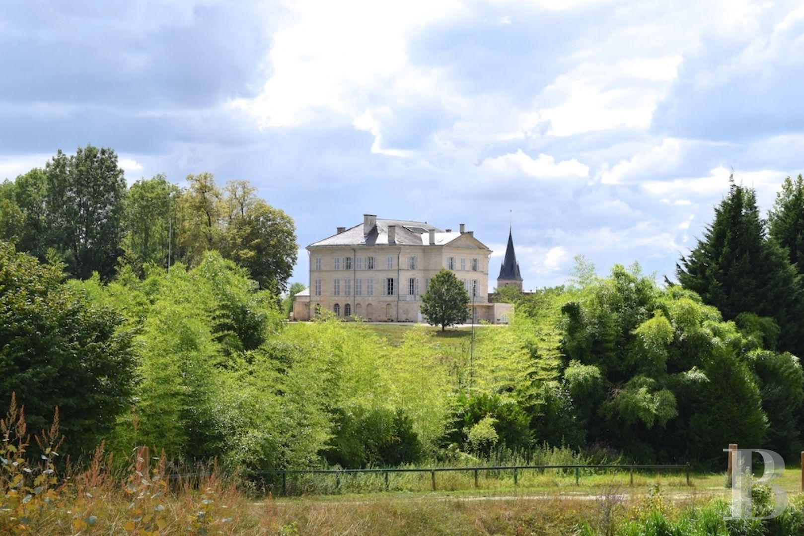 An 1810, listed, neoPalladian style chateau, resulting from and