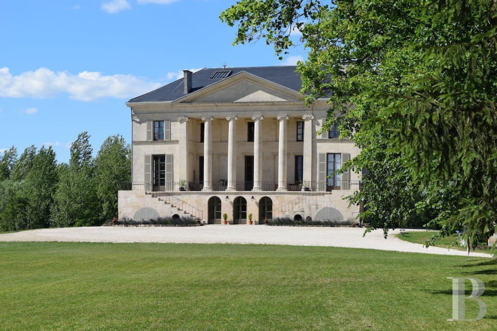 An 1810, listed, neoPalladian style chateau, resulting from and