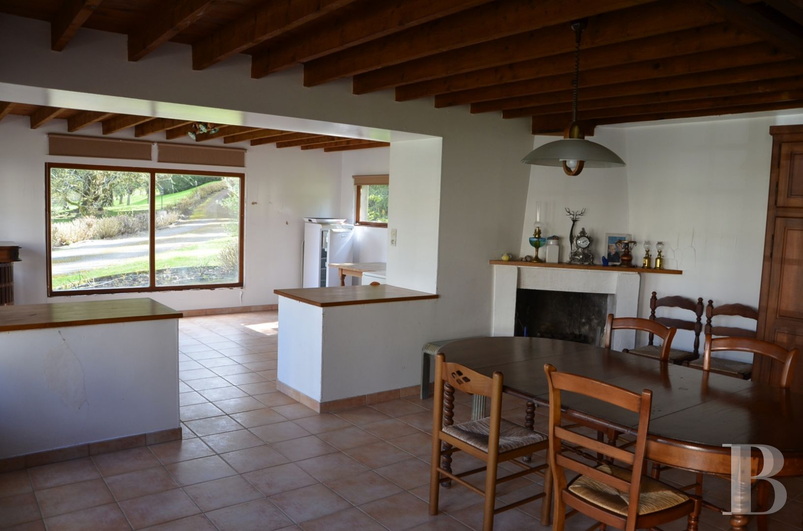 A renovated, 17th century mill, like a liner protruding from the waves