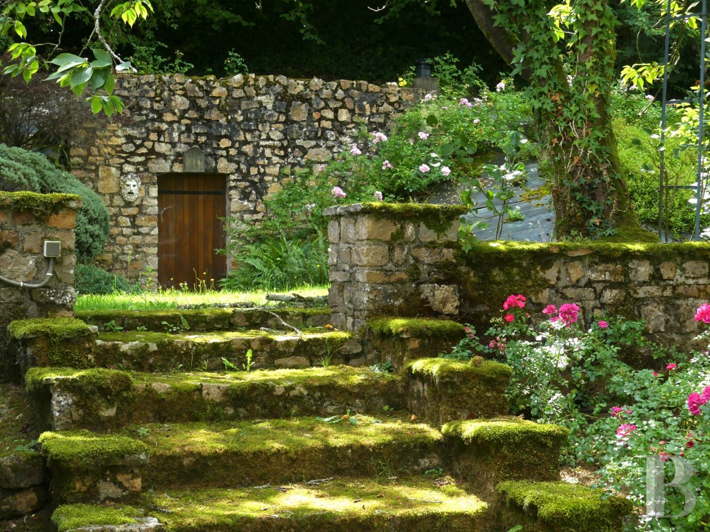 A renovated, 17th century mill, like a liner protruding from the waves