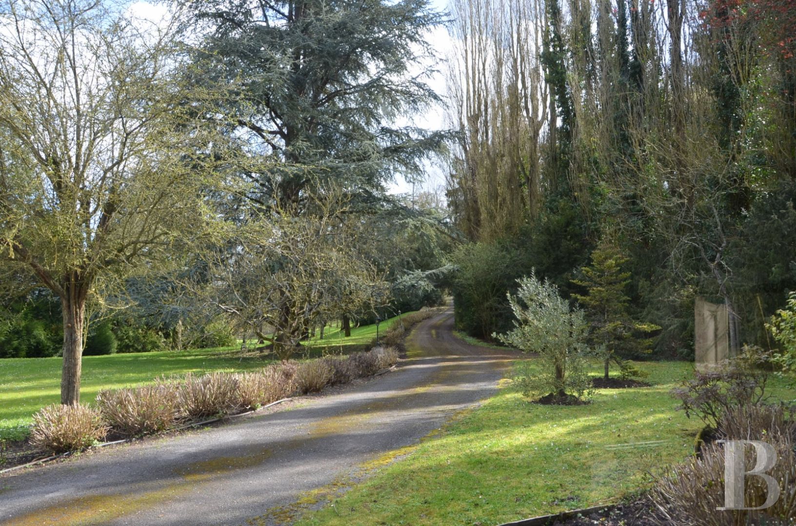 A renovated, 17th century mill, like a liner protruding from the waves