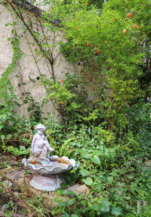 À Paris, près du jardin du Luxembourg, un rez-de-jardin ouvert sur les arbres et la verdure - photo  n°16