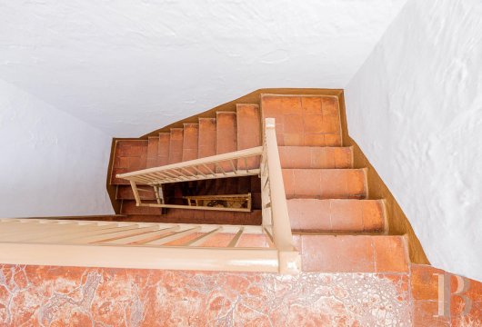 Dans le quartier de Contramurada, à Ciutadella, une maison ancienne sur trois niveaux